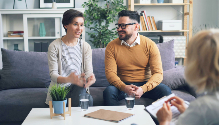 Communication Issues in Relationships: How Therapy Can Help You Reconnect 1 healthy communication couple at therapy by Miami Therapist Lotus Counseling