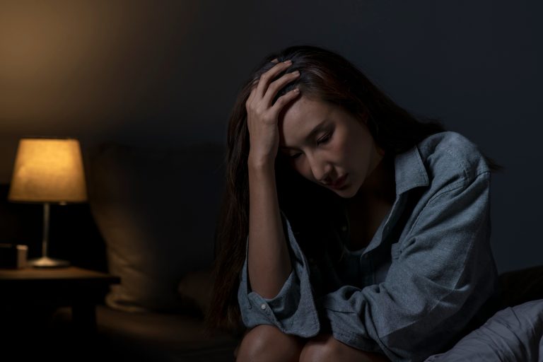 Woman suffering from depression and insomnia